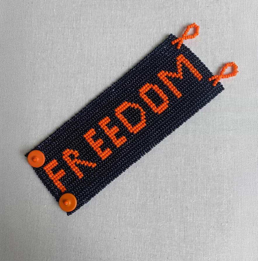 A beaded bracelet with the word 